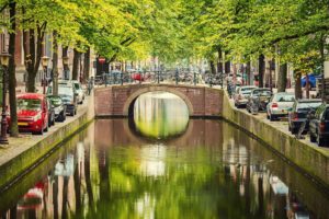 Take the Bus or Train from Schiphol to Amsterdam